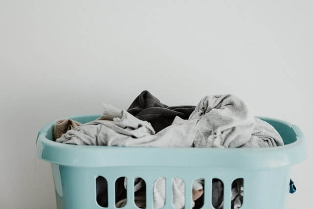 a basket full of dirty washing