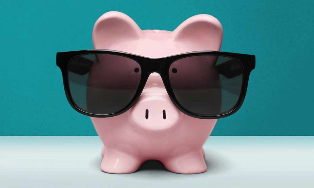 Piggy bank wearing sunglasses