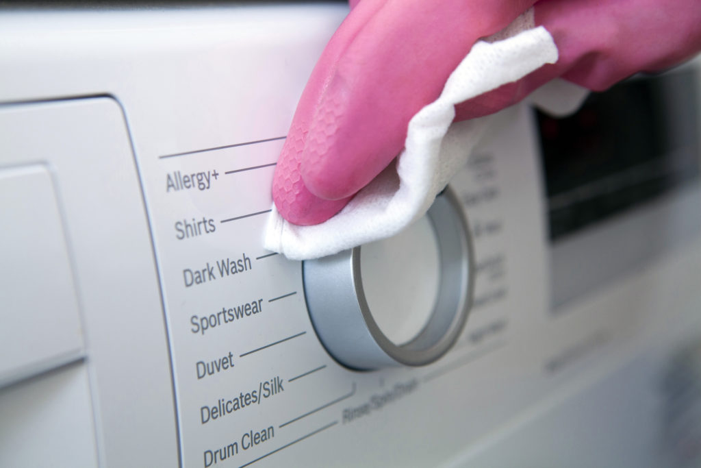 wiping washing machine knob