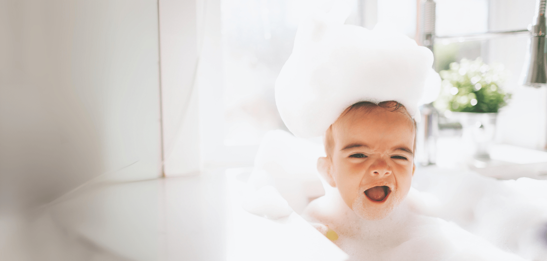kid in bubble bath