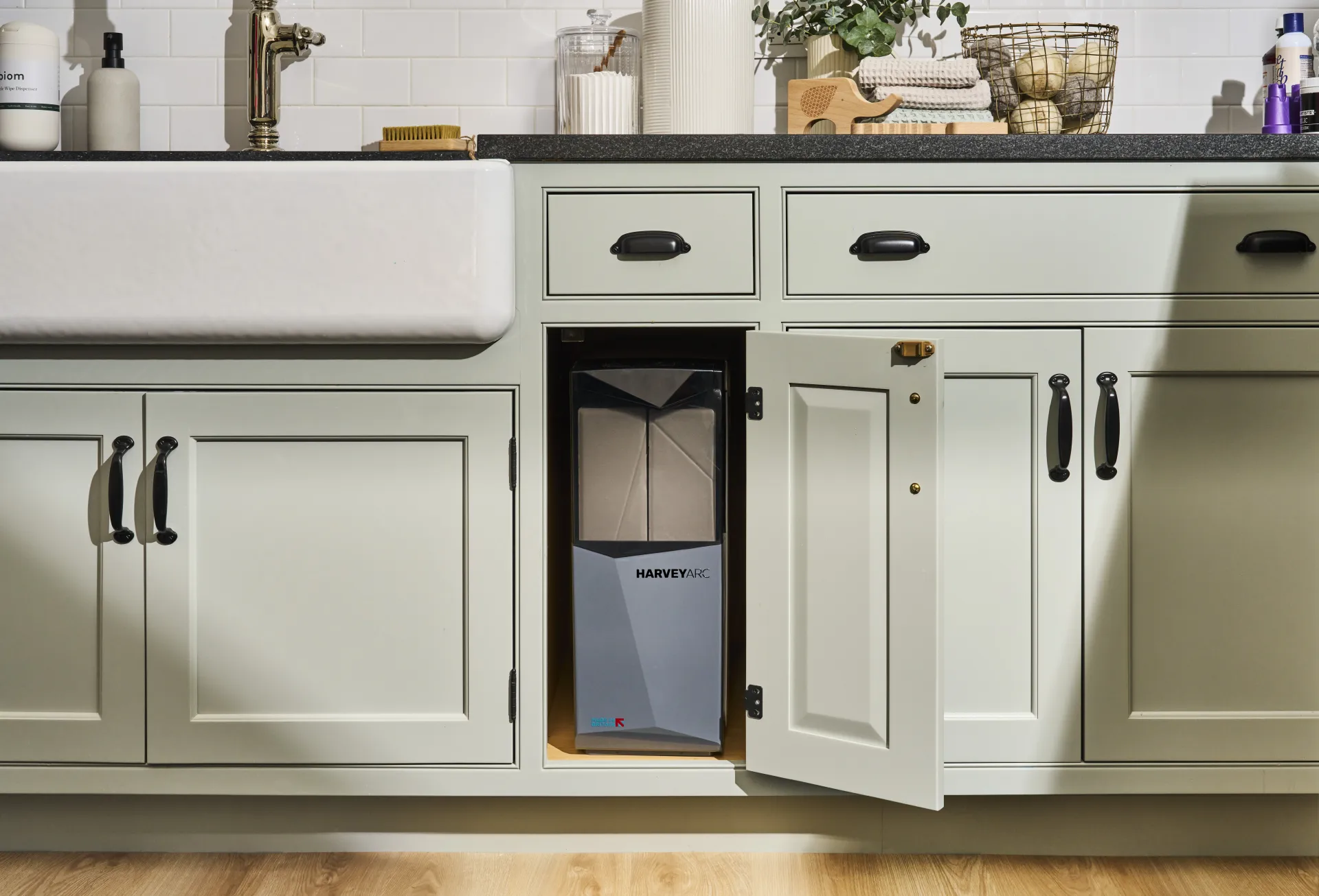 water softener in cupboard